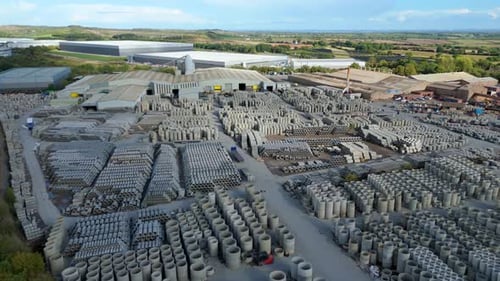 High altitude drone shot of concrete production facility in Coalville UK with visible casting