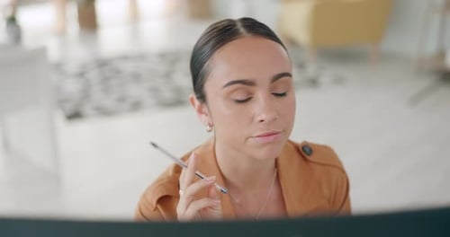 Business woman, thinking and planning strategy in a creative office for project management