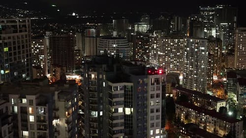 Illuminated Cityscape at Night from Above