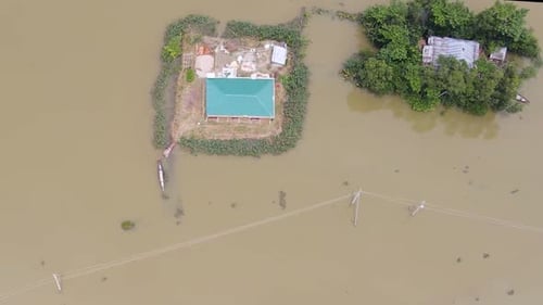 Top View Of An Extreme Flooded Village With Floating Houses In Bangladesh, South Asia. Aerial Drone