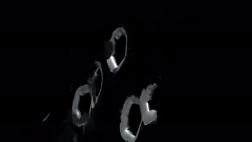 Impact Collection: Side angle view of five big gunshot fired on black metal