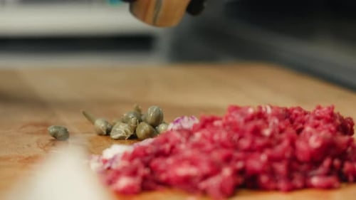 Preparing Gourmet Food with Meat and Fresh Ingredients