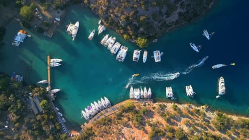 Aerial view of yachts moored in turquoise water, Turkey.