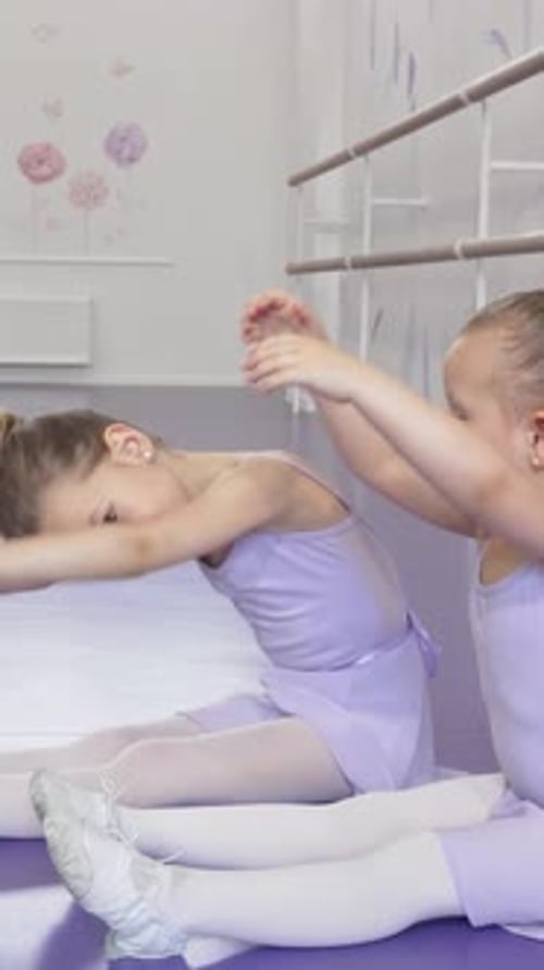 Charming Little Ballerinas Stretching in Perfect Harmony at Dance School