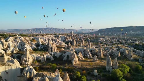 Colorful Hot Air Balloons Over Cappadocia Landscape