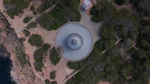 Aerial video of the Moscarter lighthouse, in Portinatx, a town in the north of the island of Ibiza