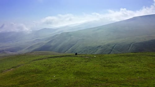 Flying Over Green Hills In Highlands Of Georgia On Sunny Summer Day