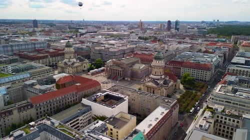 Gorgeous aerial view flight panorama curved drone
of French and German Cathedral Dom on Gendarmenmar
