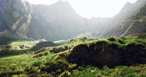 Majestic Mountain Landscape Captured During Golden Hour in a Lush Valley
