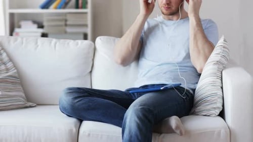 Technology, People And Lifestyle Concept - Closeup Of Man With Tablet Pc Computer And Earphones L...