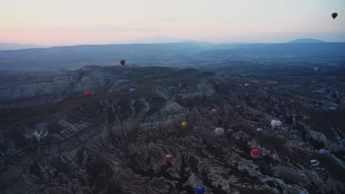 Aerial view of hot air balloons in Cappadocia at sunset