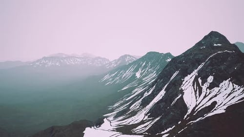 Fog Over High Mountain Peak
