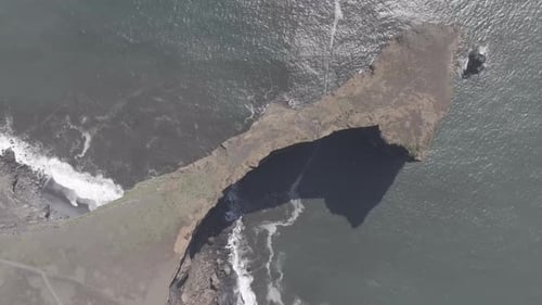 Aerial video over the cliffs of Dyrhulai, South Iceland