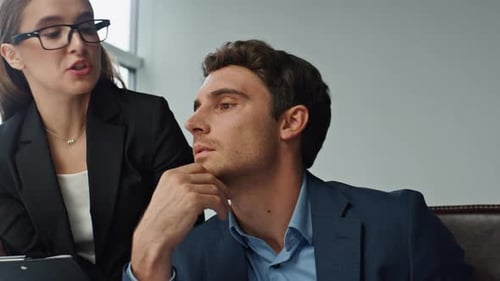 Marketing Professionals Discussing Project in Office Closeup