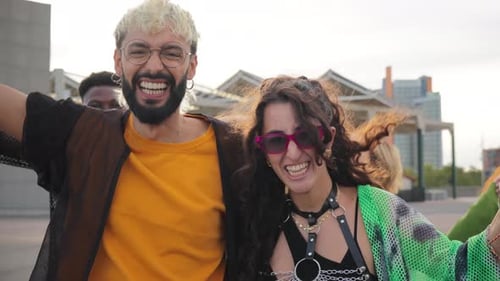 Diverse Group Celebrates Pride in Urban Setting