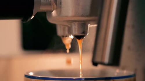 Espresso Machine Brewing Hot Coffee at Home