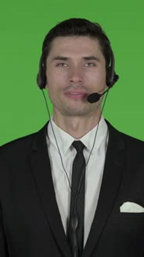 Technical Businessman Talking on Headset, Chroma Key, vertical video
