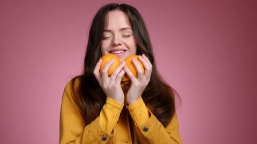 Closeup View of Young Gardener Feeling Proud of Her Harvest