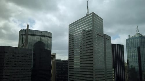 Time Lapse of Clouds Passing By Quickly over Downtown Dallas, Texas with Camera Zoom Out