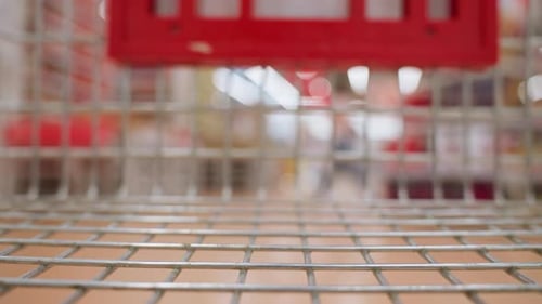 FirstPerson View of Shopping Trolley in Motion Inside a Mall