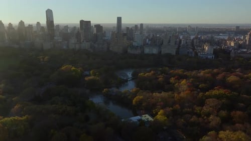 Warm Morning Light Envelops Central Park and Midtown Manhattan Skyline Casting Shadows From
