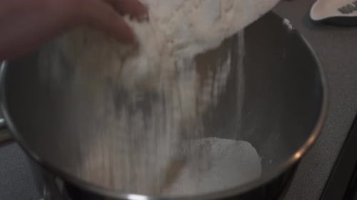 Pouring Flour into a bowl