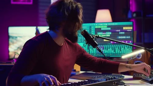 Musician Composing Music in Home Studio at Night