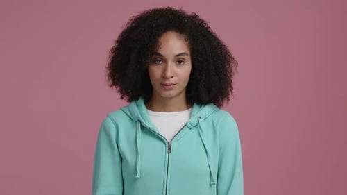 Woman Rolling Eyes in Close Up Studio Shot