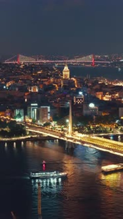 Istanbul's bridges and Galata Tower at night