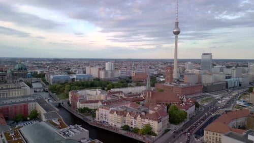 Wonderful aerial view flight of skyline Berlin city center at summer 2022. 4k boom slide to right dr