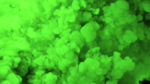 the bubbling of thick green smoke