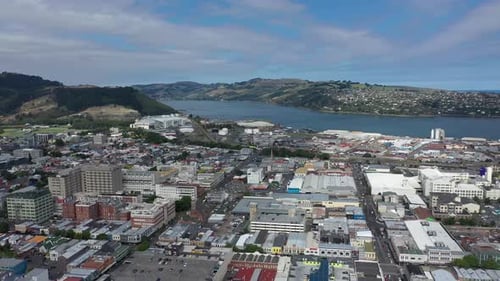 aerial view over dunedin in new zealand, east coast city dunedin in new zealand, drone shot over an