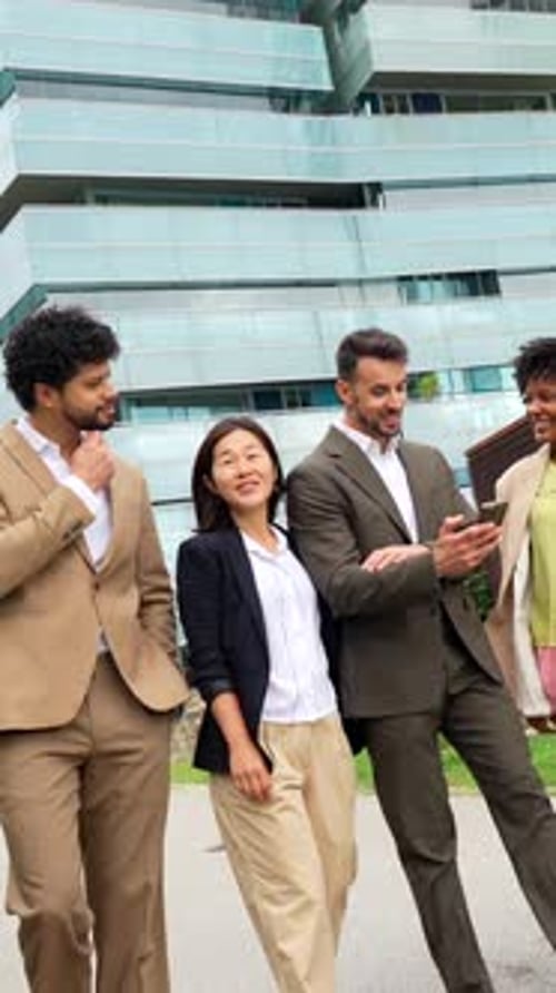 Multiethnic Business People Chatting Relaxed Walking Along Financial District