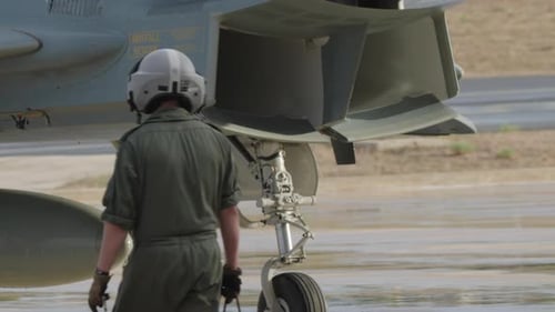 Fighter Jet Landing Gear on Wet Runway