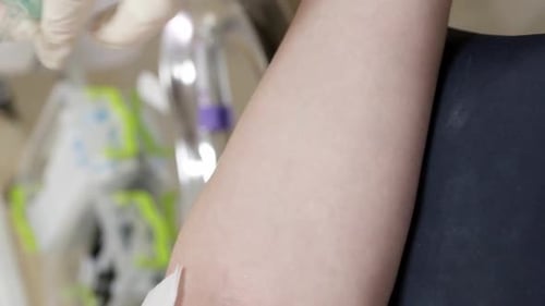 Medical Professional Drawing Blood from Patient's Arm