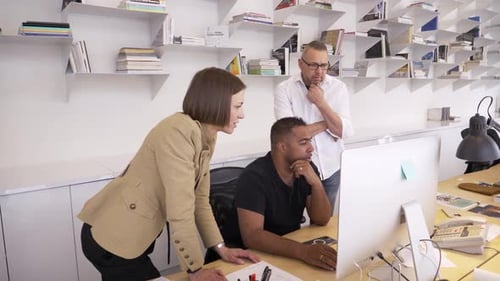 Business People Meeting Talking at Computer in Office 3539 Years