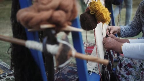 Handloom Closeup Hands of Woman Manually Weaving Fabric or Textile on Loom