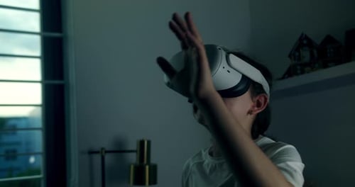 Girl Using Virtual Reality Headset at Home