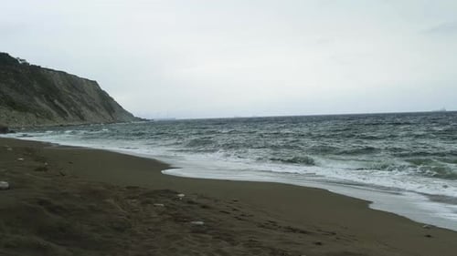 Gorrondatxe Beach in Basque Country. Horizontal on the beach on a sunny day, Spain. Cantabrian Sea