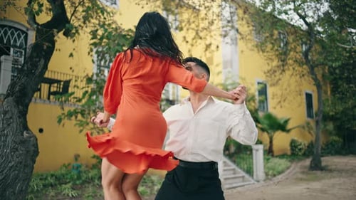 Professional Pair Dancing Hot Rumba in Park Couple Latino Performers Moving