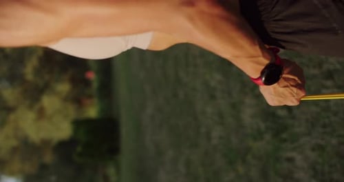 Person Exercising with Resistance Band Outdoors