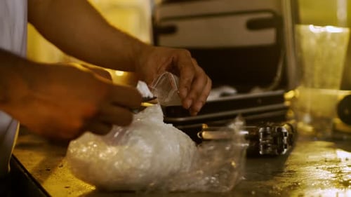 Brutal Drug Dealer Takes Packet Drug Brick out of the Suitcase and Cuts it with a Knife and Packs S