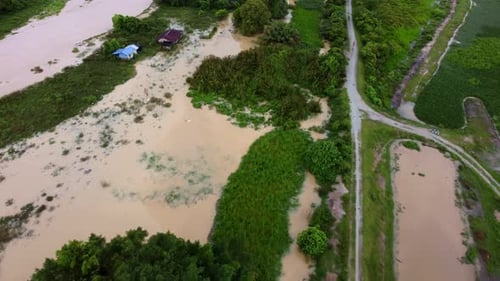 Drone shot fly over flood village