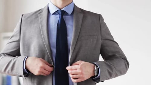 People, Business, Fashion and Formal Wear Concept - Close Up of Businessman