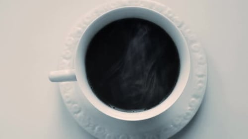Steaming Cup of Coffee Top Down Close Up