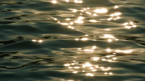 The sea's surface glittered with sparks.