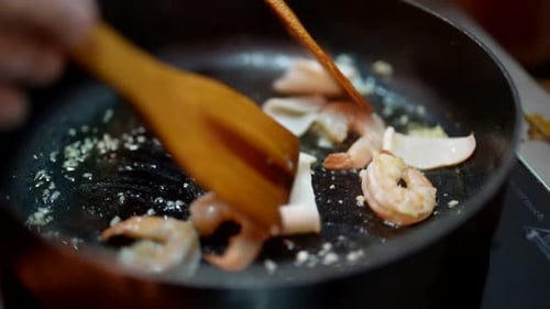 Close up of Seafood Cooking in a Pan