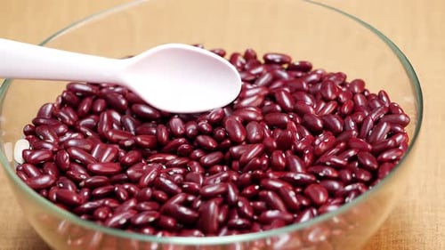 Kidney Beans in a Glass Bowl with Spoon