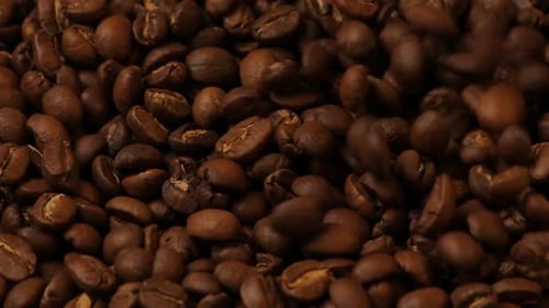 Coffee Beans Being Poured Close Up