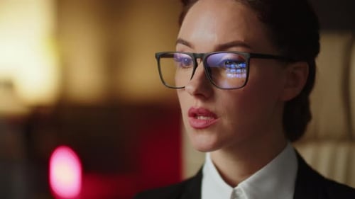 Professional Woman With Glasses Looking at Computer